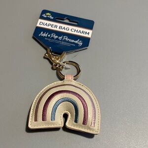 Itzy Ritzy Puffy Diaper Bag Charm in the pink rainbow design NWT